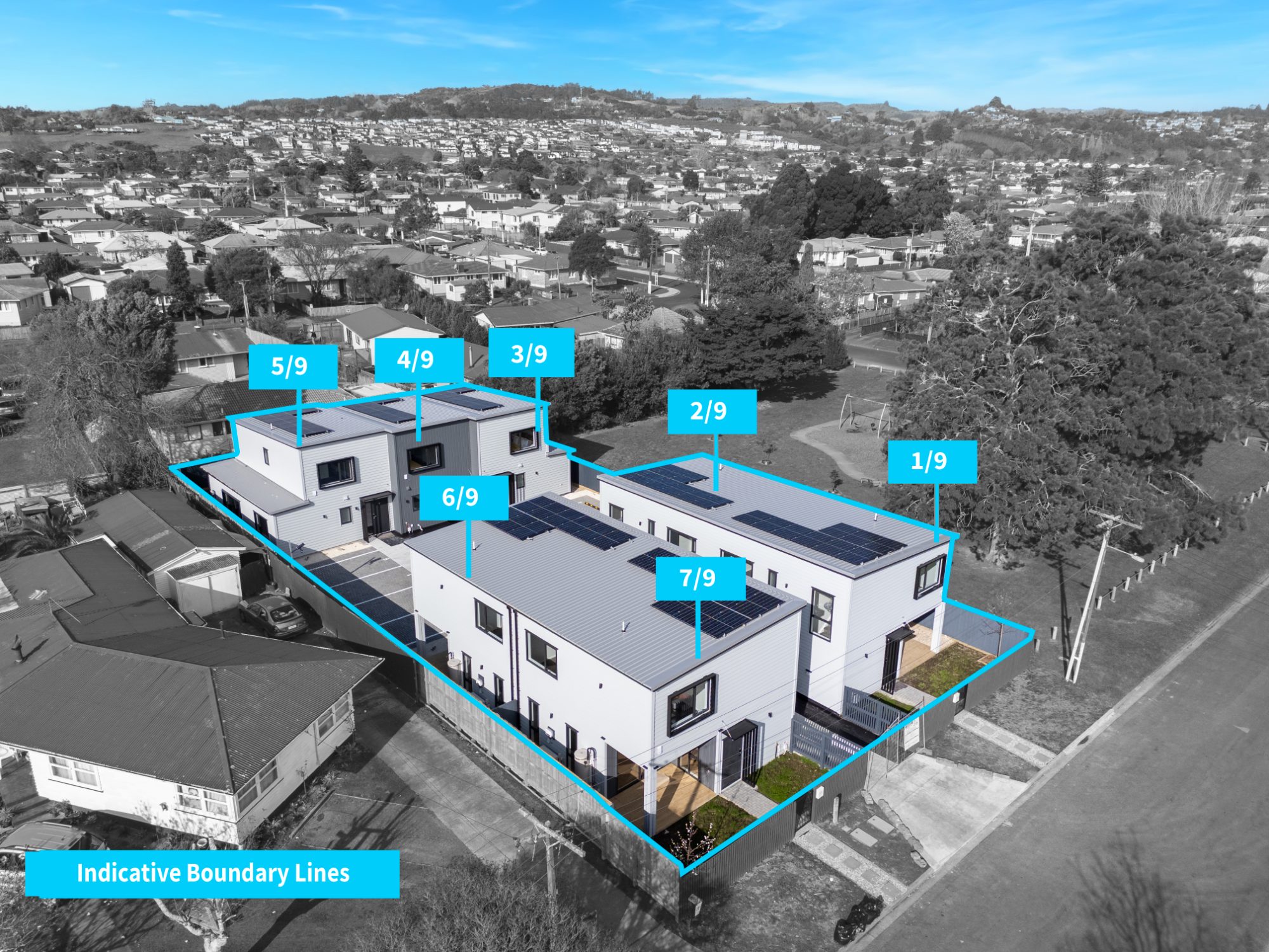 Aerial photo of a townhouse development in Auckland with indicative boundary lines marked