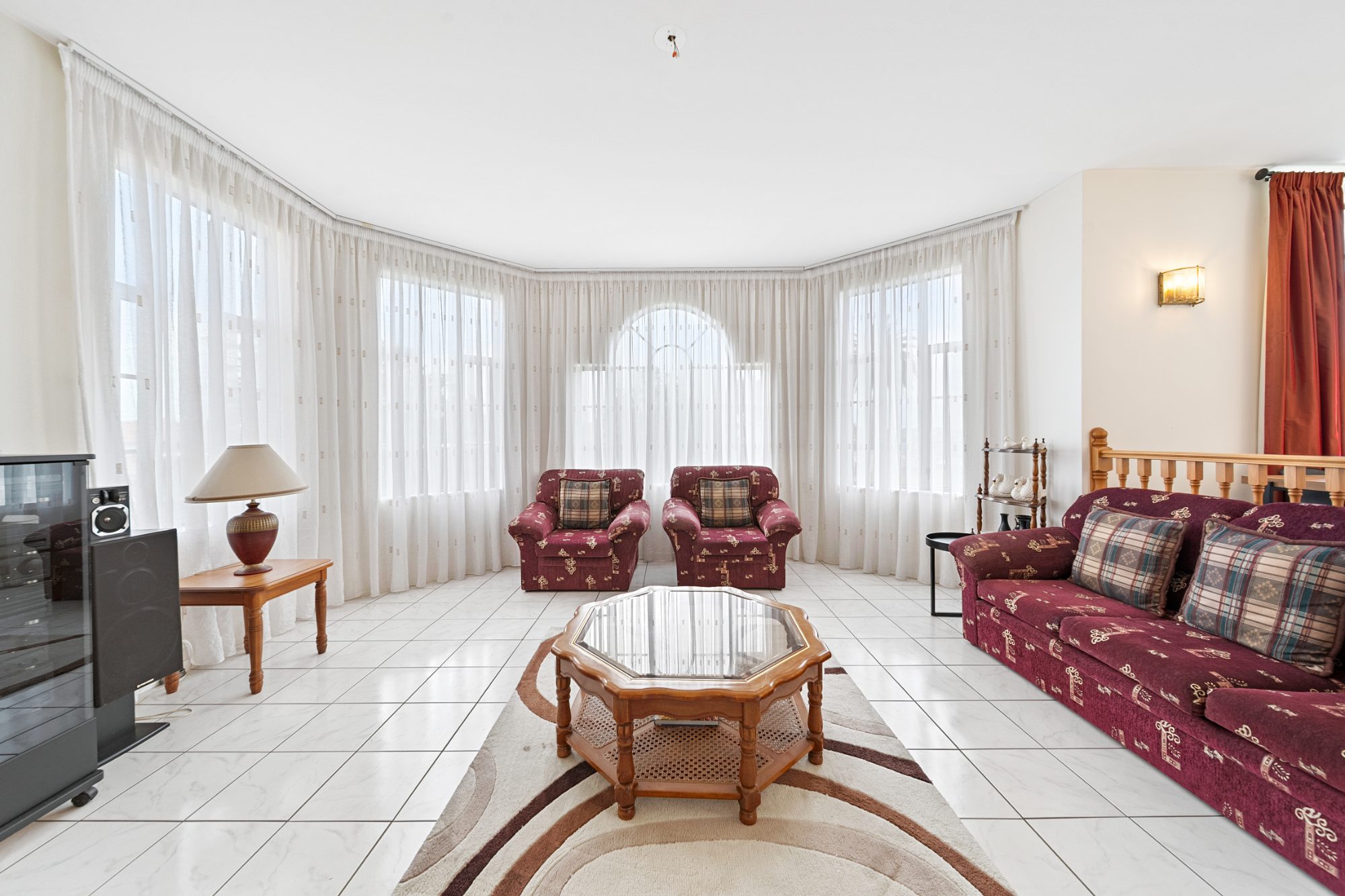 Formal lounge with bay windows in a Dannemora home