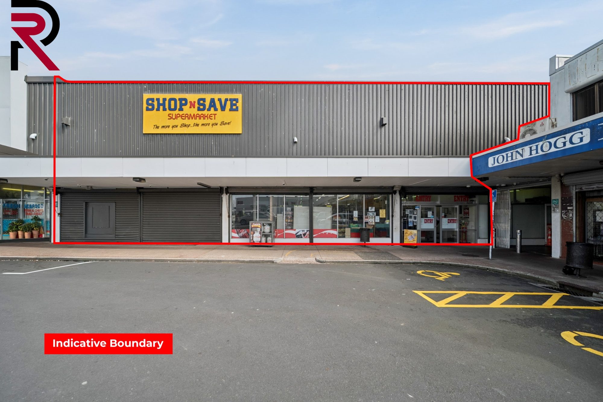 Retail shopfront and car park in Māngere with an indicative boundary marked