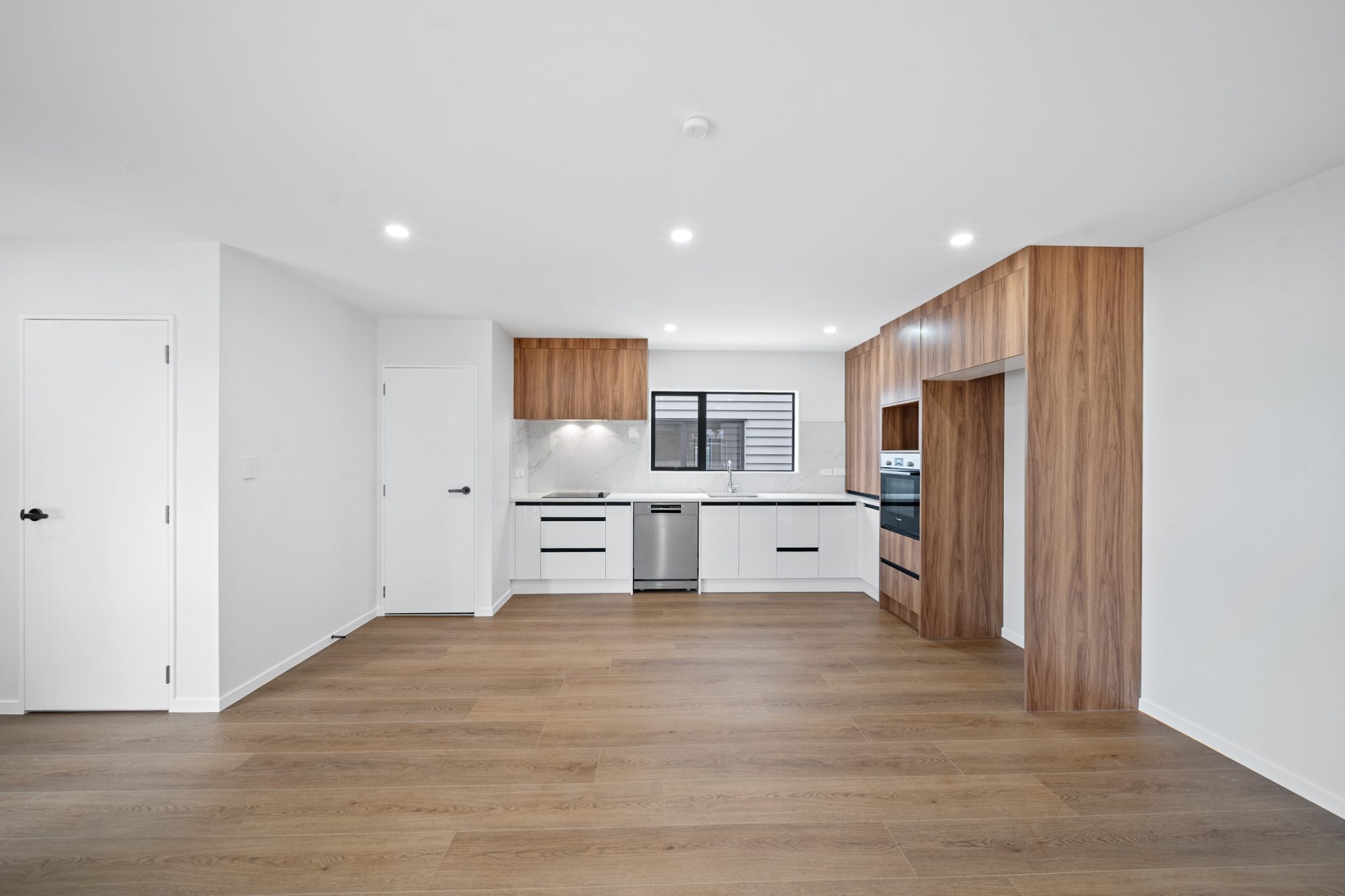 Kitchen and living area in a new-build home in Papakura