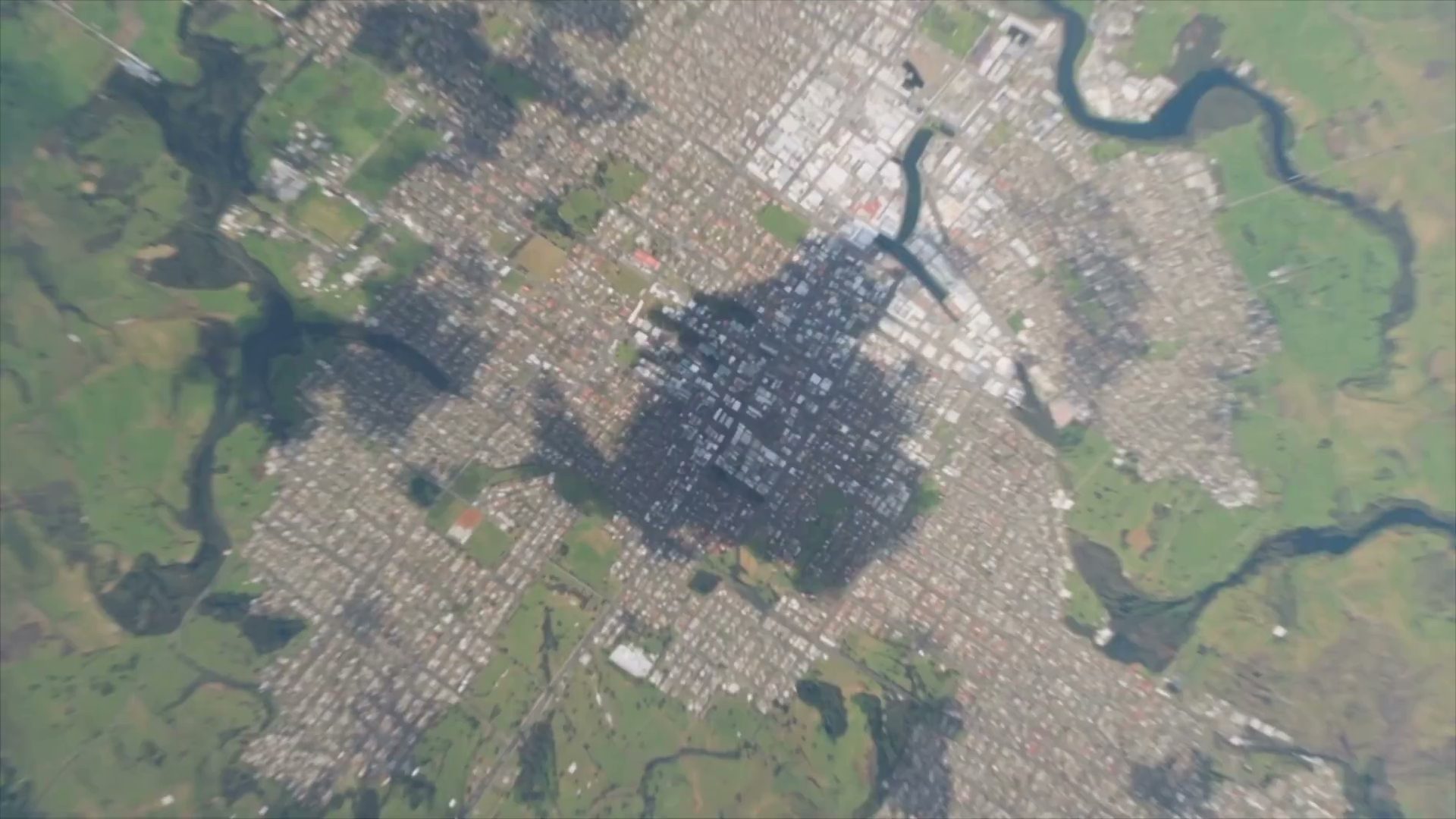Satellite-style opening frame of a commercial property film in Auckland