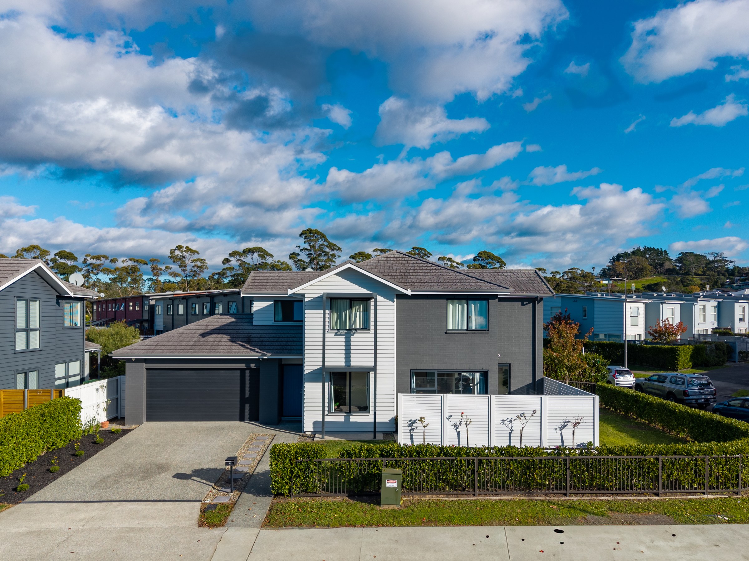 Aerial view of a modern two-storey home in Swanson, West Auckland